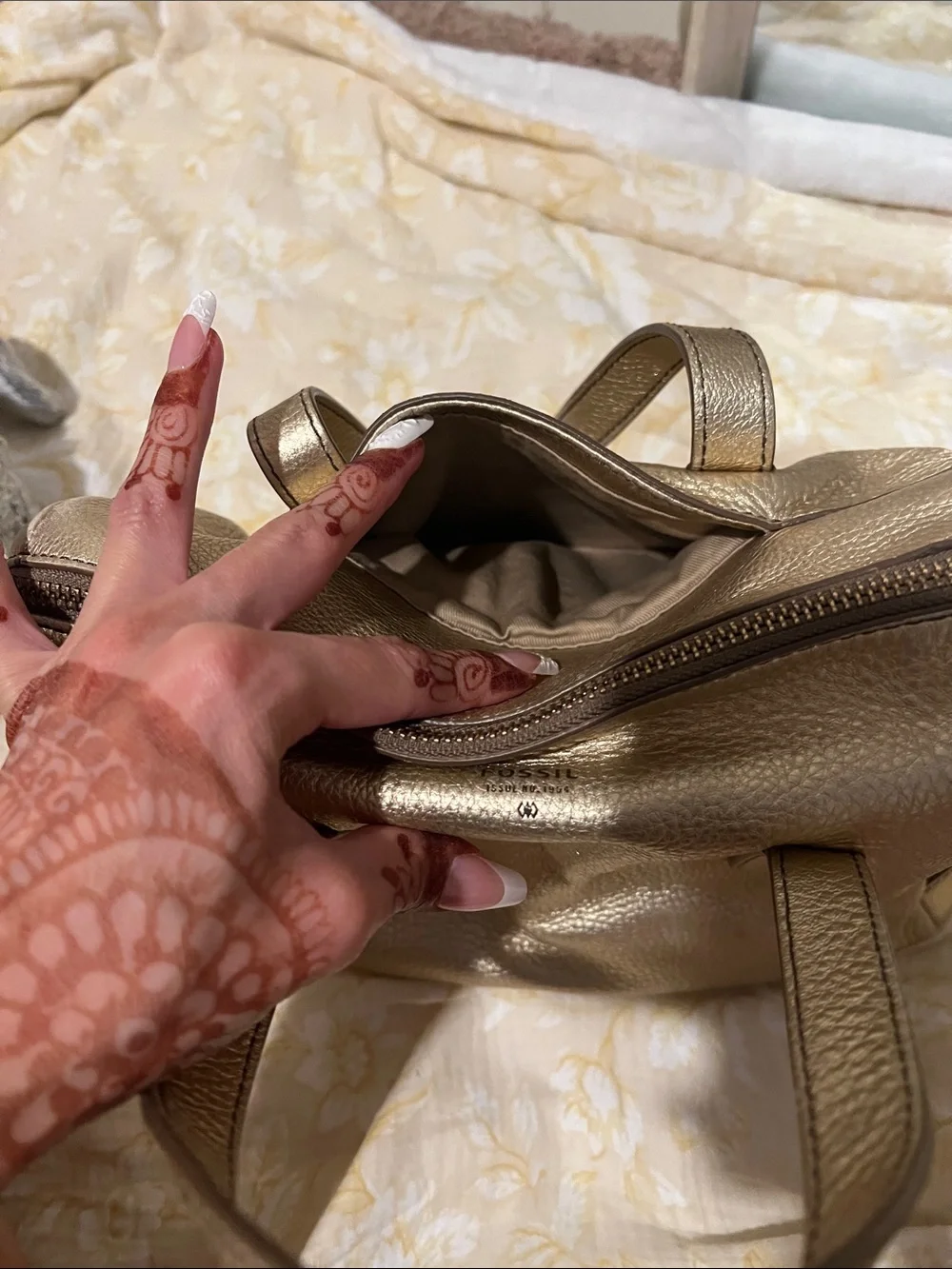 Fossil metallic leather duffle